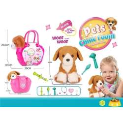 Piesek w torbie z akcesoriami