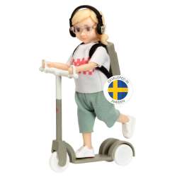 Lalka dziewczynka na hulajnodze